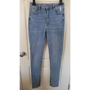 Dogma Light Wash Light Distressed Skinny Jeans